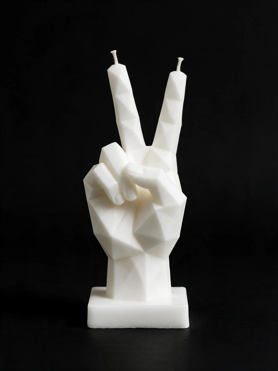 VAV V Sign sculptural candle in white on black